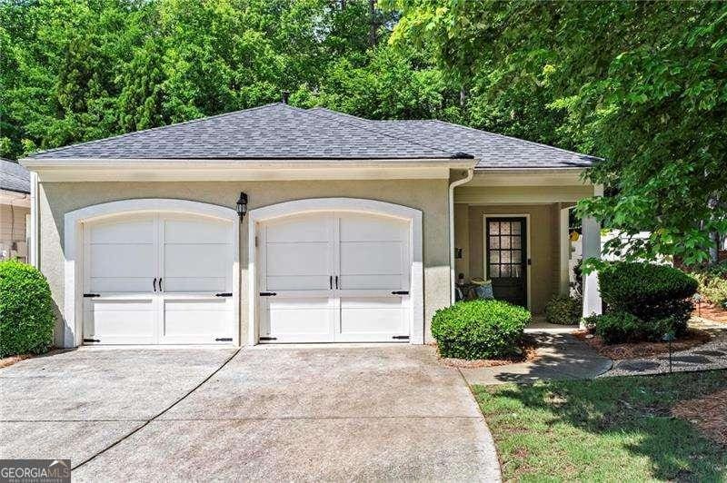 4068 Cottage Oaks Dr, Acworth, GA 30101 - garage with concrete driveway