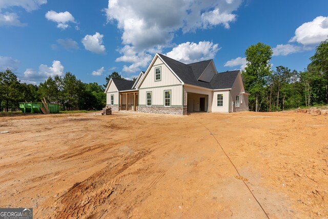 modern inspired farmhouse featuring board and batten siding