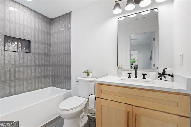full bath with toilet, vanity, tile patterned flooring, and bathtub / shower combination