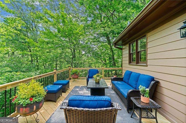 deck with an outdoor hangout area