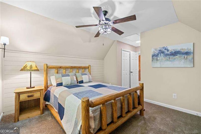 bedroom with vaulted ceiling, carpet flooring, baseboards, and ceiling fan