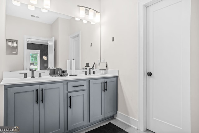 2744 Bell Dr SE, Smyrna, GA 30080 - full bath featuring double vanity and baseboards