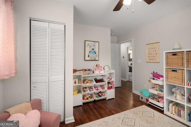 283 Norton Cir SE, Smyrna, GA 30082 - playroom featuring wood finished floors, a ceiling fan, and baseboards