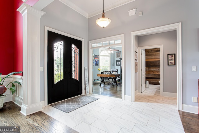 1365 Ivy Plantation, Monroe, GA 30656 - entryway with french doors, ornate columns, ornamental molding, and ceiling fan