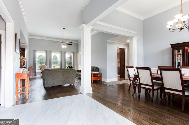 1365 Ivy Plantation, Monroe, GA 30656 - dining room featuring ornate columns, ceiling fan, a chandelier, crown molding, and marble finish floors