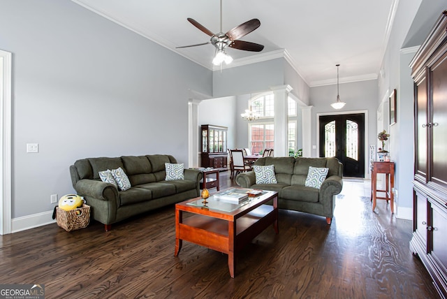 1365 Ivy Plantation, Monroe, GA 30656 - living room with decorative columns, dark wood-style floors, a ceiling fan, crown molding, and a chandelier