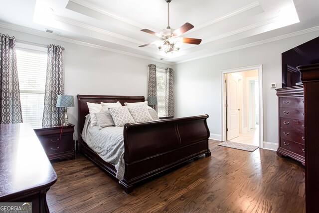 1365 Ivy Plantation, Monroe, GA 30656 - bedroom featuring a raised ceiling, dark wood-style flooring, ornamental molding, and ceiling fan