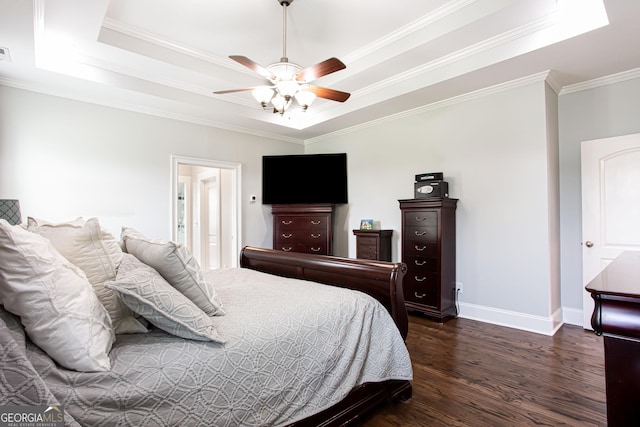 1365 Ivy Plantation, Monroe, GA 30656 - bedroom with a tray ceiling, dark wood-type flooring, crown molding, and ceiling fan