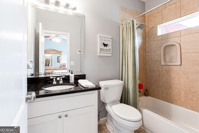 1365 Ivy Plantation, Monroe, GA 30656 - bathroom featuring vanity, toilet, shower / tub combo, and ceiling fan