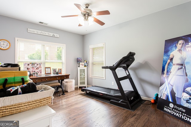 1365 Ivy Plantation, Monroe, GA 30656 - exercise room featuring a ceiling fan, wood finished floors, and baseboards