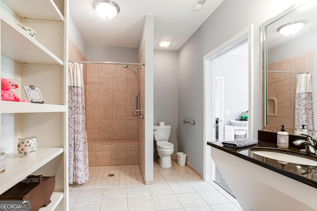 1365 Ivy Plantation, Monroe, GA 30656 - bathroom with tile patterned flooring, toilet, and a tile shower