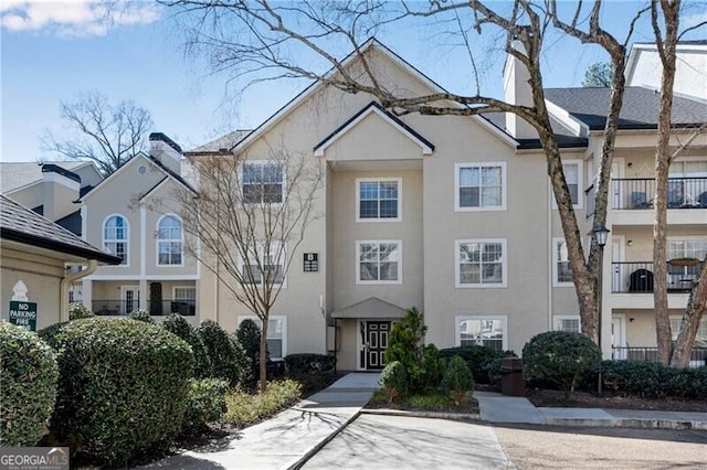 view of front of house featuring stucco siding