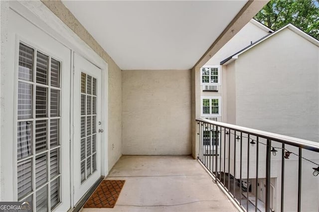 balcony featuring french doors