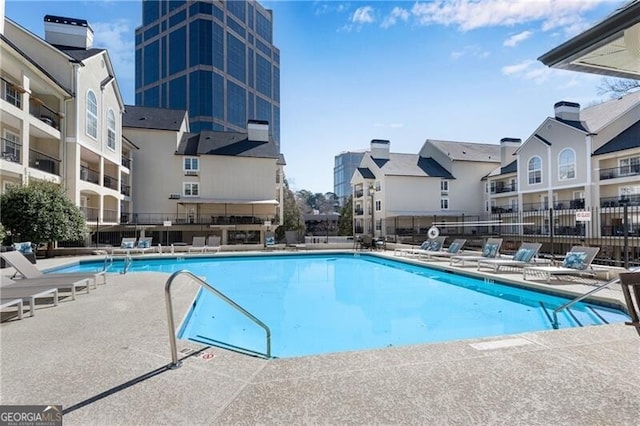 3655 Habersham Rd NE Unit 244B, Atlanta, GA 30305 - community pool with fence and a patio area