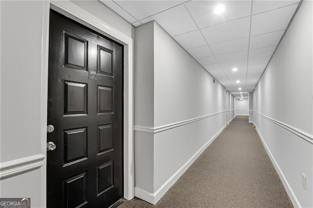 hall featuring baseboards, carpet flooring, and recessed lighting