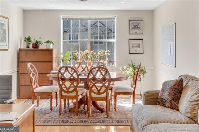 3655 Habersham Rd NE Unit 244B, Atlanta, GA 30305 - dining area with light wood-type flooring