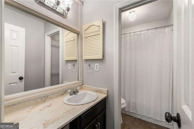 1140 Moorestown Cir, Decatur, GA 30033 - bathroom with toilet, vanity, tile patterned floors, and curtained shower