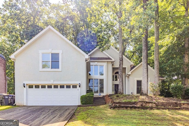 5335 Lexington View Pl, Sugar Hill, GA 30518 - traditional home with a garage, driveway, and stucco siding