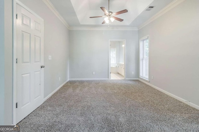 5335 Lexington View Pl, Sugar Hill, GA 30518 - empty room featuring ceiling fan, carpet flooring, a tray ceiling, and ornamental molding
