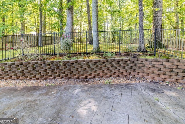 surrounding community featuring a patio area and a fenced backyard