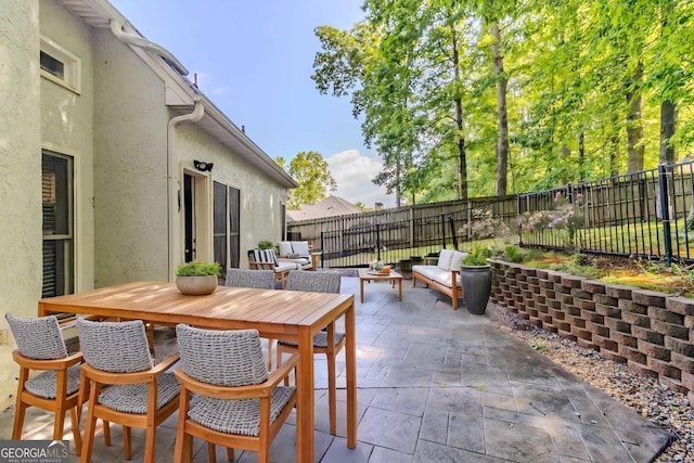 5335 Lexington View Pl, Sugar Hill, GA 30518 - fenced backyard with a patio and an outdoor hangout area