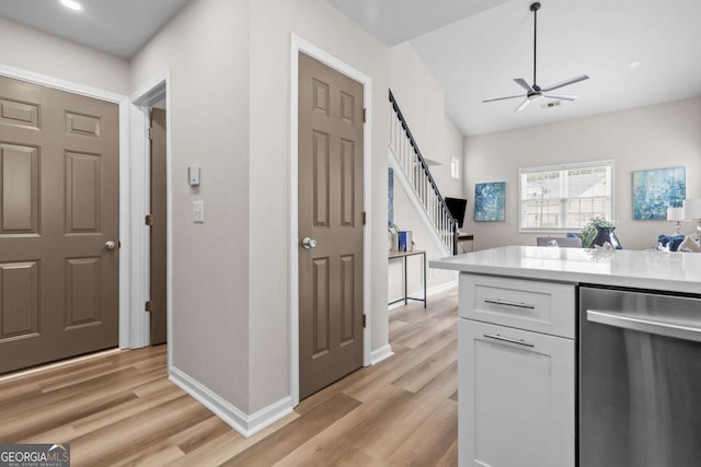 222 Harmony Ct, Alpharetta, GA 30004 - kitchen featuring stainless steel dishwasher, white cabinetry, light wood finished floors, light countertops, and recessed lighting