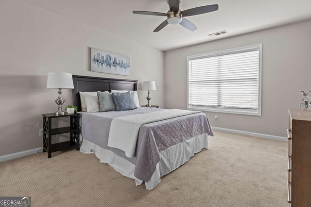 222 Harmony Ct, Alpharetta, GA 30004 - bedroom featuring baseboards, light colored carpet, and a ceiling fan