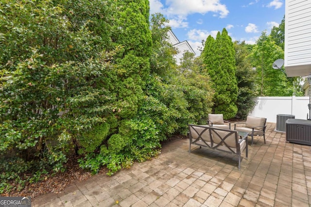 222 Harmony Ct, Alpharetta, GA 30004 - view of patio with outdoor lounge area, cooling unit, and fence