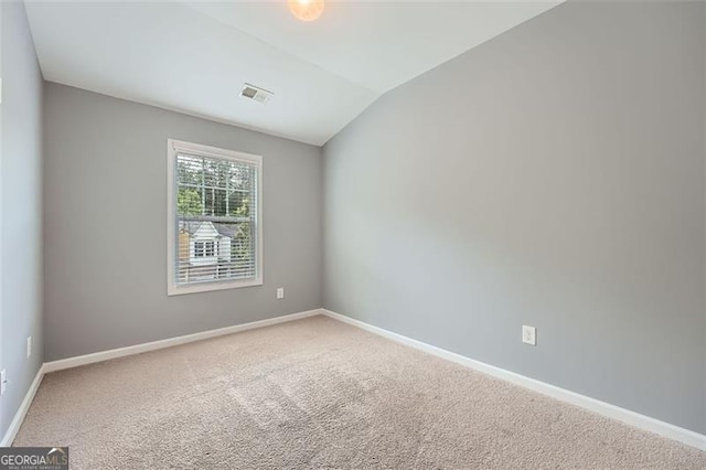 3807 Cyrus Ridge Way, Kennesaw, GA 30152 - carpeted empty room featuring lofted ceiling and baseboards