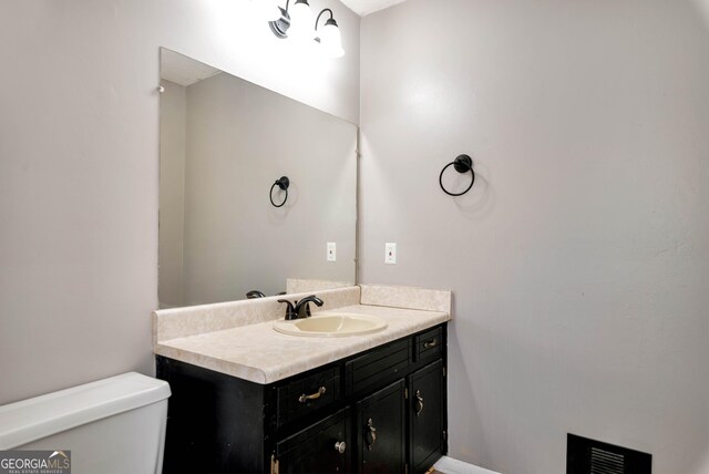 1405 Lumpkin County Pkwy, Dahlonega, GA 30533 - half bath featuring toilet and vanity