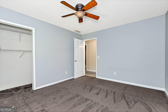 1405 Lumpkin County Pkwy, Dahlonega, GA 30533 - unfurnished bedroom featuring carpet, baseboards, a closet, and ceiling fan