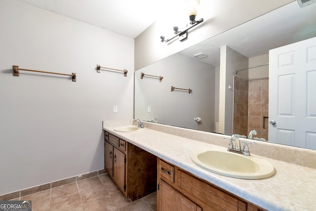 1405 Lumpkin County Pkwy, Dahlonega, GA 30533 - bathroom with double vanity, a shower, tile patterned floors, and baseboards