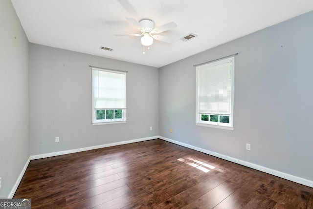 1405 Lumpkin County Pkwy, Dahlonega, GA 30533 - unfurnished room with healthy amount of natural light, a ceiling fan, wood-type flooring, and baseboards