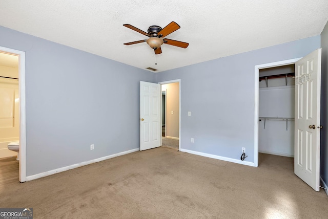 1405 Lumpkin County Pkwy, Dahlonega, GA 30533 - unfurnished bedroom featuring carpet flooring, baseboards, a closet, and ensuite bath