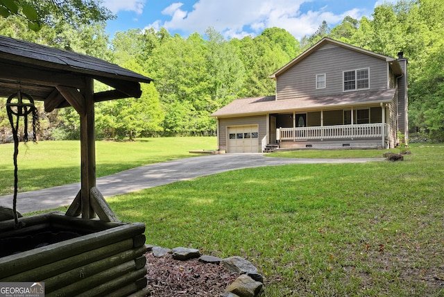 1405 Lumpkin County Pkwy, Dahlonega, GA 30533 - view of front of home with covered porch, asphalt driveway, an attached garage, a front yard, and a chimney