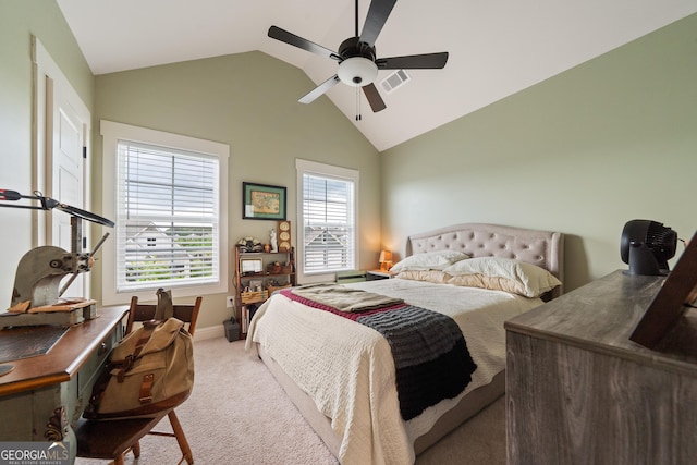 bedroom featuring a desk, light carpet, baseboards, ceiling fan, and high vaulted ceiling