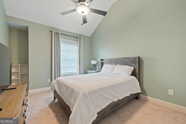 bedroom featuring carpet floors, baseboards, a ceiling fan, and high vaulted ceiling