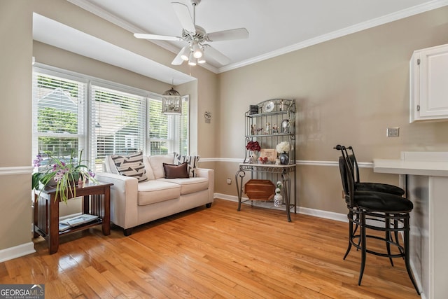 1201 Bridle Path, Marietta, GA 30068 - living room featuring crown molding, light wood-type flooring, baseboards, and a ceiling fan