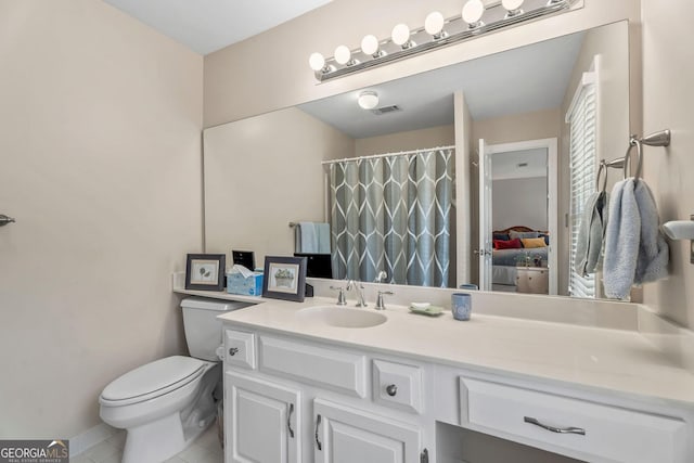 1201 Bridle Path, Marietta, GA 30068 - bathroom with toilet, vanity, and a shower with shower curtain