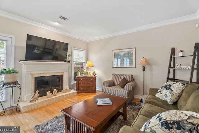 1201 Bridle Path, Marietta, GA 30068 - living room featuring ornamental molding, wood finished floors, a brick fireplace, and baseboards