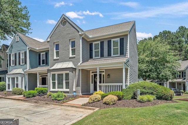 1201 Bridle Path, Marietta, GA 30068 - view of front of home with a porch, roof with shingles, and uncovered parking