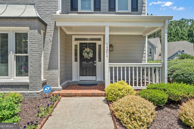 1201 Bridle Path, Marietta, GA 30068 - property entrance featuring a porch and brick siding