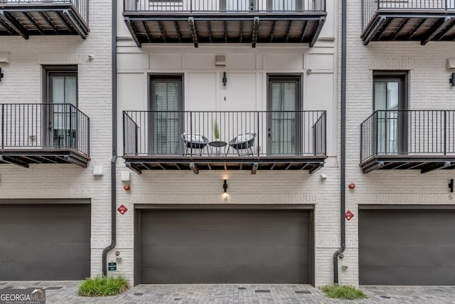 574 Boulevard Pl NE Unit 4, Atlanta, GA 30308 - view of property with a garage and driveway