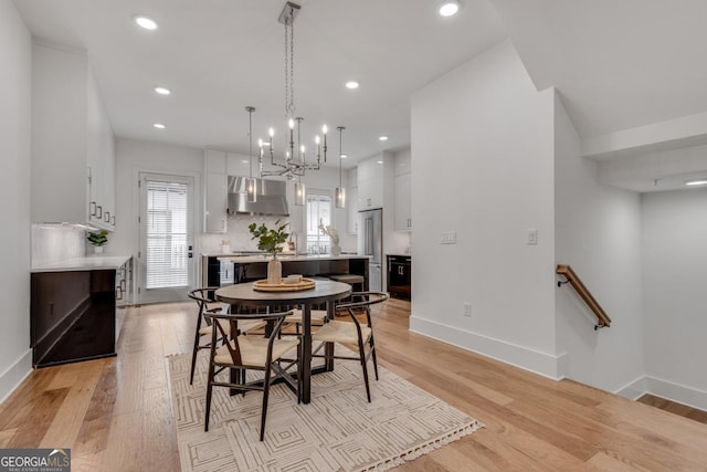 574 Boulevard Pl NE Unit 4, Atlanta, GA 30308 - dining room featuring light wood finished floors, baseboards, recessed lighting, and a chandelier