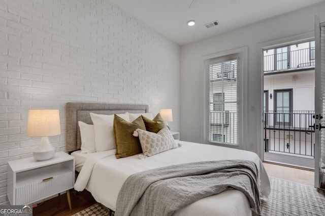 574 Boulevard Pl NE Unit 4, Atlanta, GA 30308 - bedroom featuring wood finished floors, access to exterior, and recessed lighting