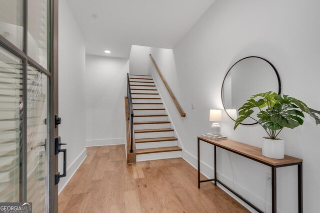 574 Boulevard Pl NE Unit 4, Atlanta, GA 30308 - stairs with wood finished floors, recessed lighting, and baseboards