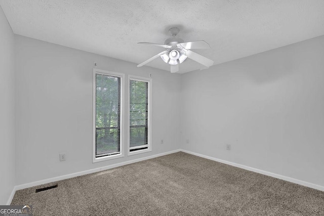 361 Gordon Valley Ln SW, Mableton, GA 30126 - carpeted empty room with a textured ceiling, a ceiling fan, and baseboards