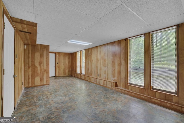 361 Gordon Valley Ln SW, Mableton, GA 30126 - spare room with wooden walls, a drop ceiling, and baseboards