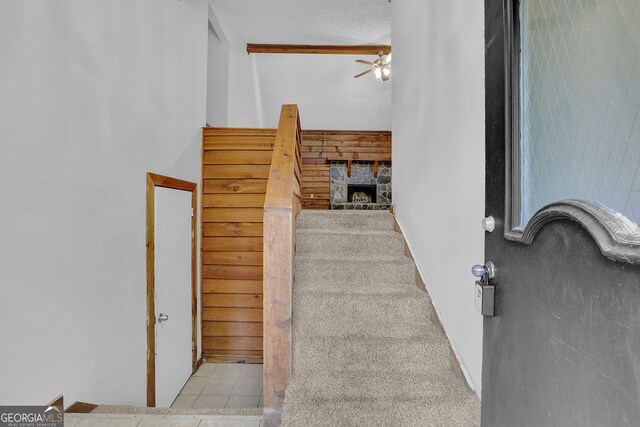 361 Gordon Valley Ln SW, Mableton, GA 30126 - stairway featuring ceiling fan, tile patterned flooring, and a fireplace