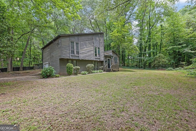 361 Gordon Valley Ln SW, Mableton, GA 30126 - view of home's exterior with a garage and a yard